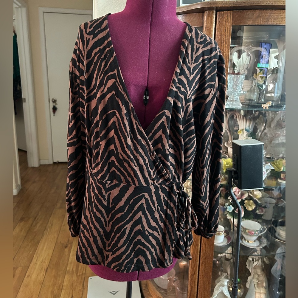 Animal Print With Sleeves. VNeckline